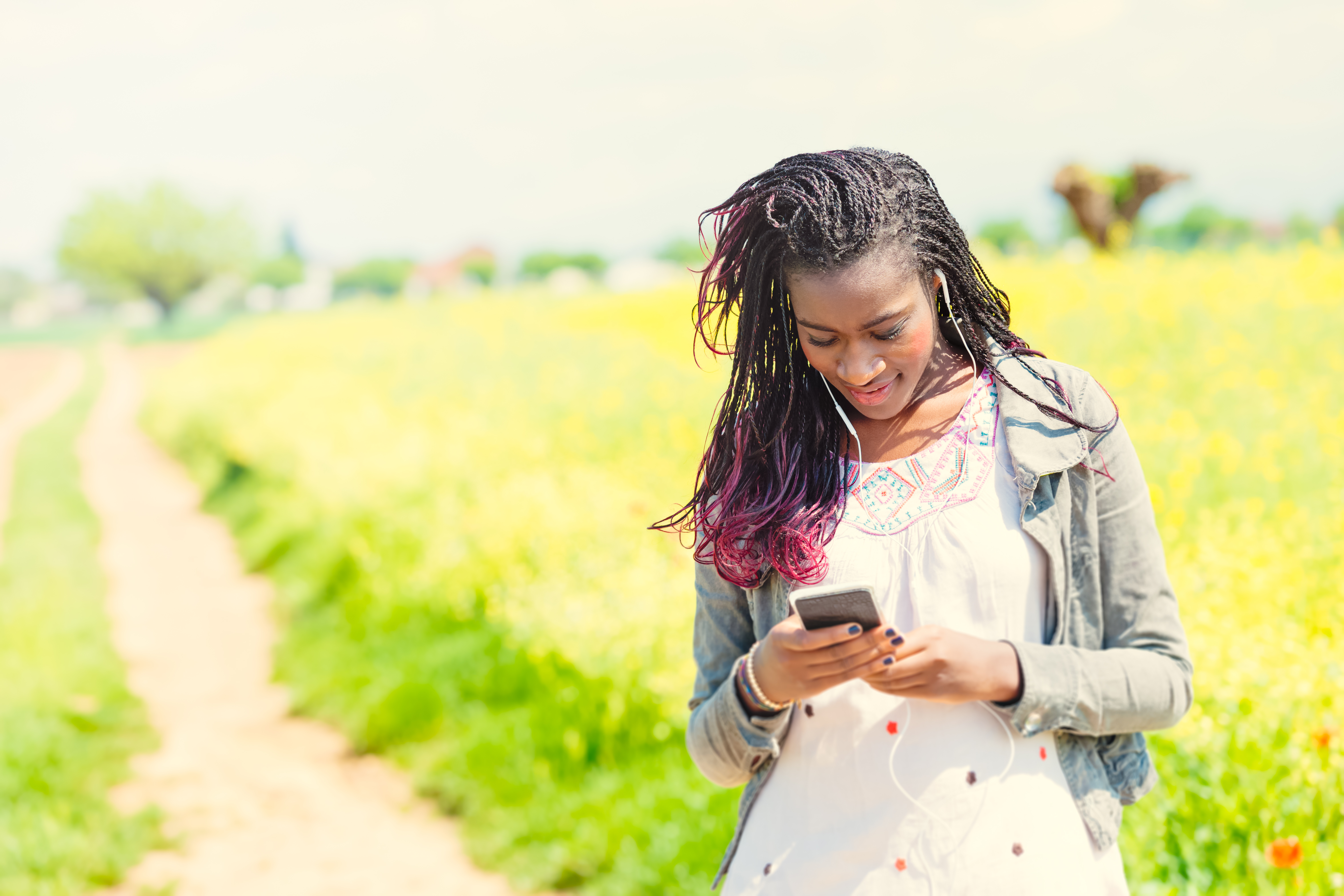 Young African woman checking for messages