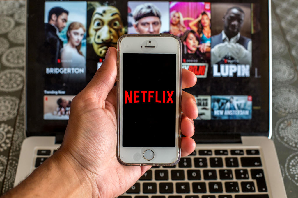 In this photo illustration the Netflix app seen displayed on...