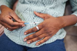 Pregnant belly and positive pregnancy test