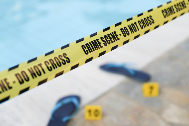 Crime Scene – Do Not Cross Tape in Swimming Pool