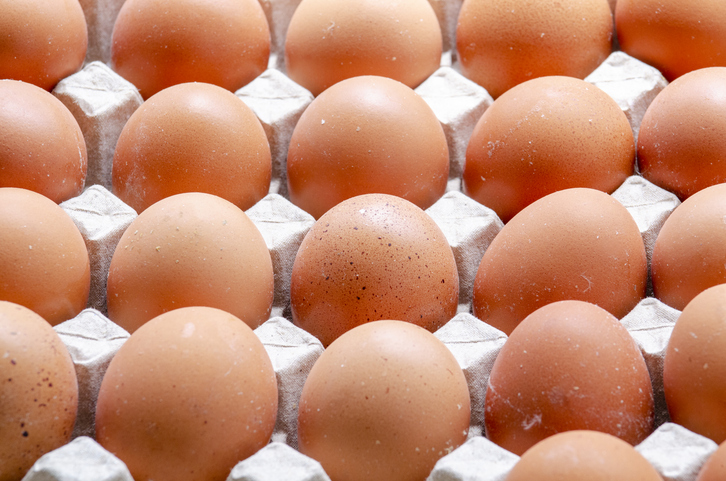 Top view of eggs on egg tray. Food and health concept.