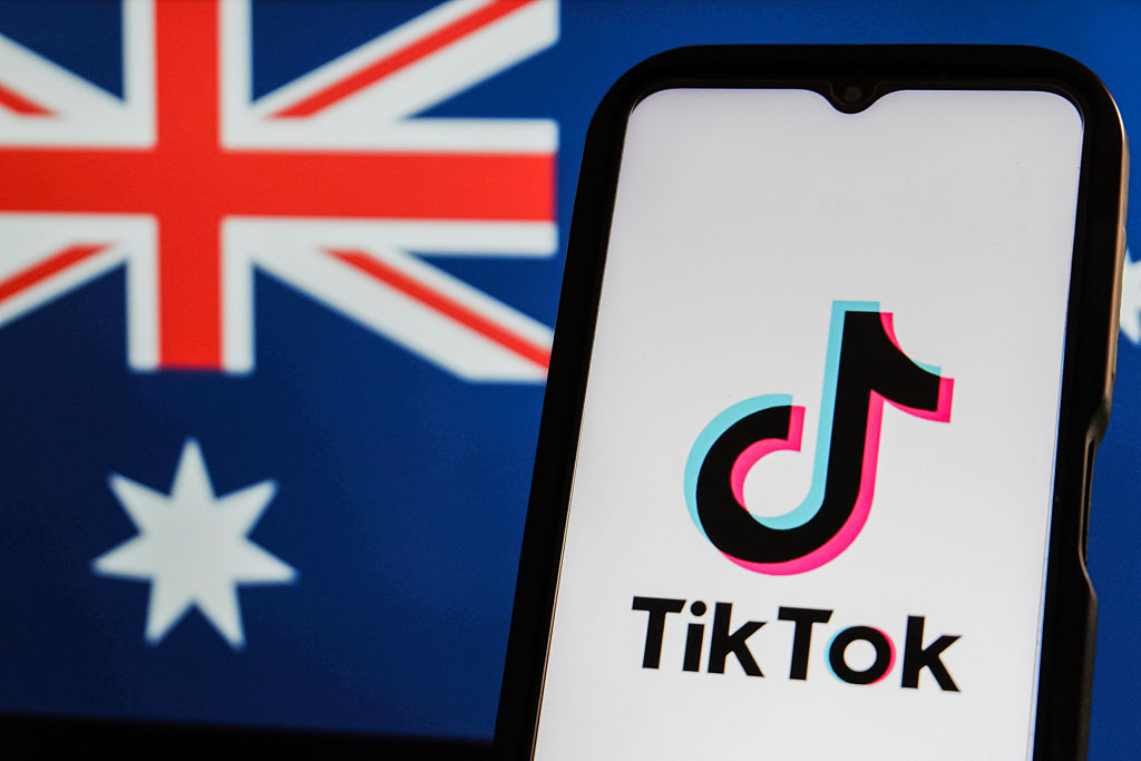 In this photo illustration, the TikTok logo is displayed on...